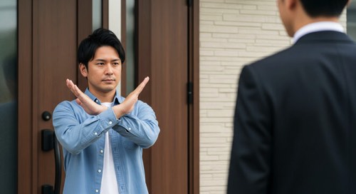 営業マンにはっきりと断る男性